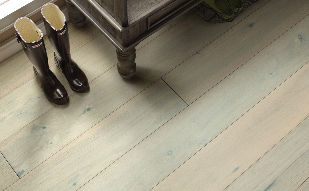 boots on luxury vinyl wood look flooring